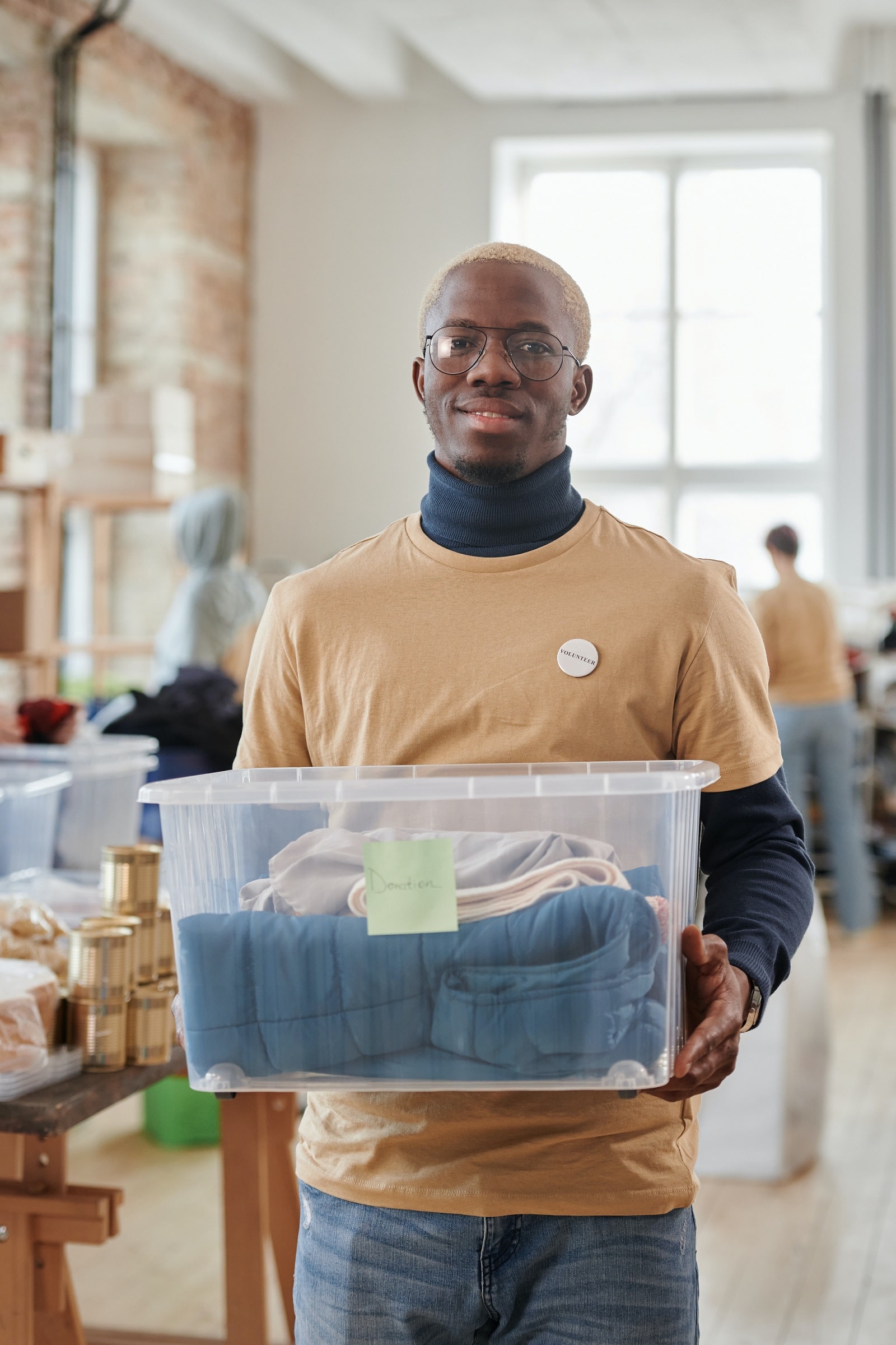 Man with the box of clothes